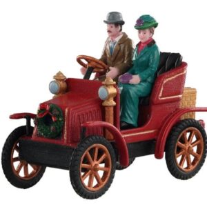 Coche antiguo con señores@*
