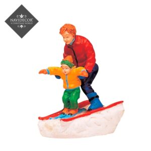 Hijo y padre esquiando*